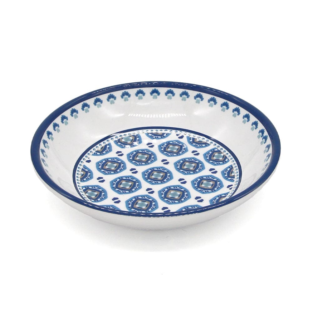 white bowl with a blue moroccan pattern
