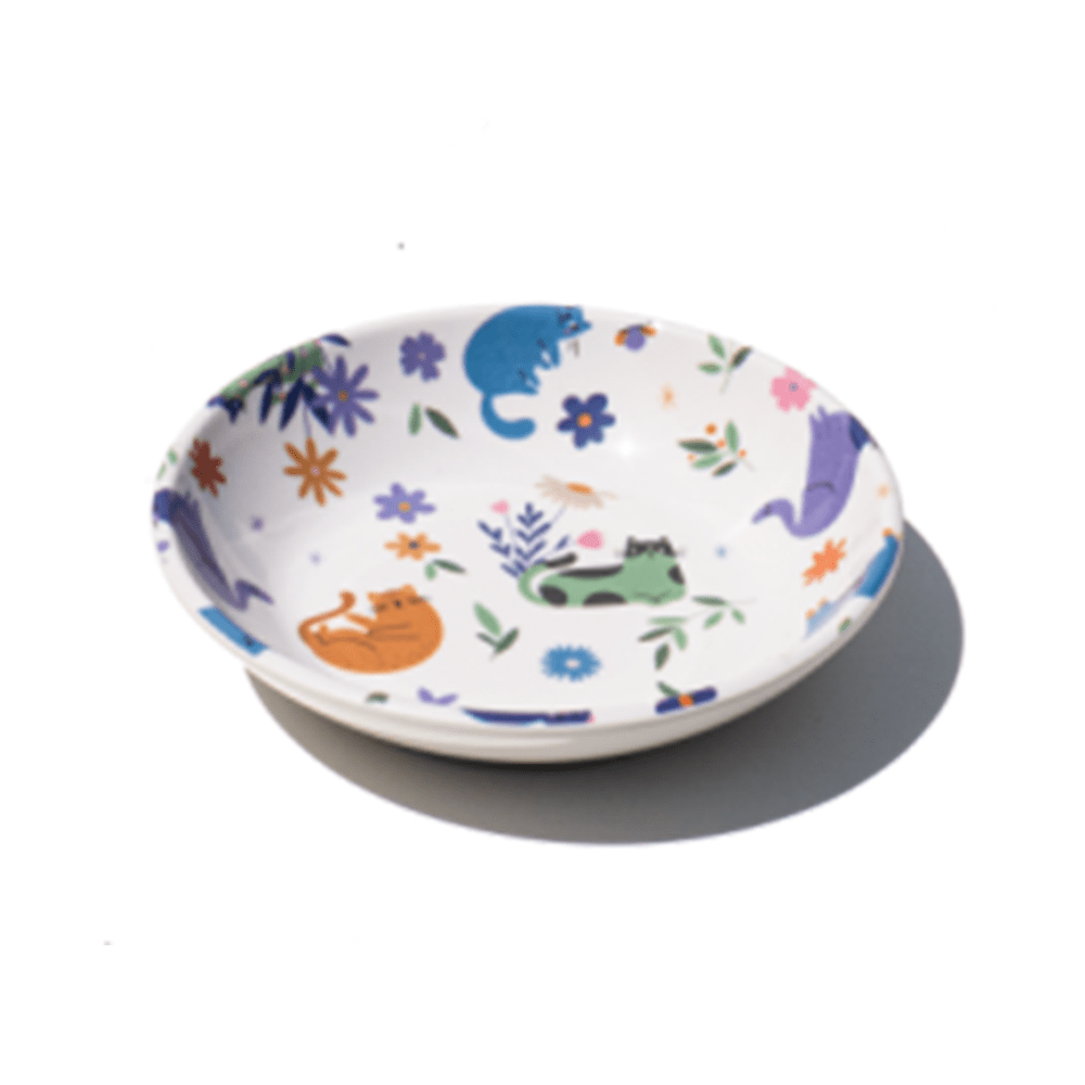 white cat saucer with colourful cats and flowers