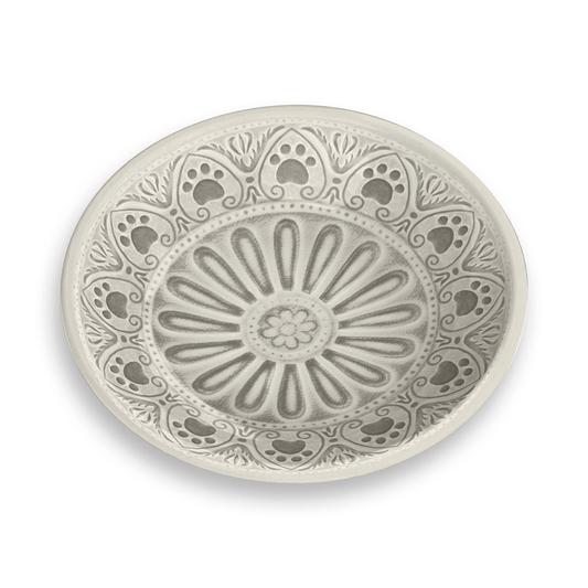 natural coloured pattern with a geometric paw print design stone coloured