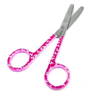 Nurses dressing scissors poodle