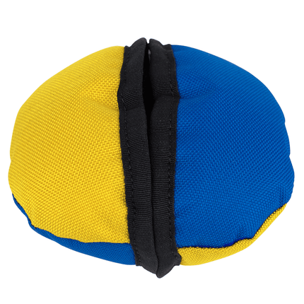 Yellow and blue mesh treat dispenser closed on a white background