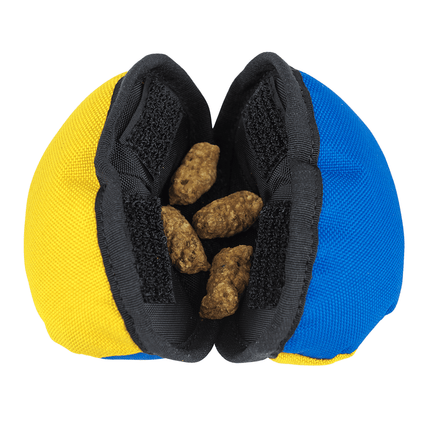 Mesh pouch, featuring yellow and blue colours, filled with dog treats, on a white background.