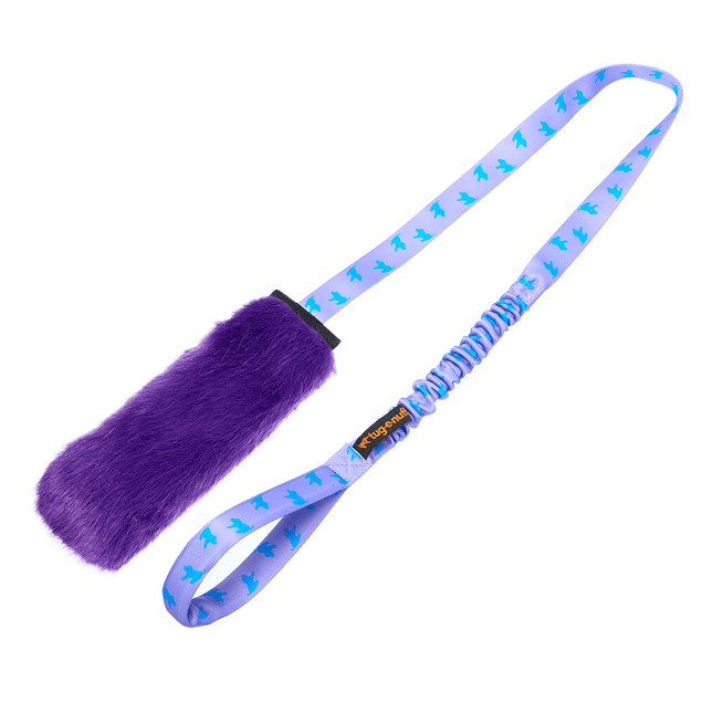Purple faux fur dog toy with a long bungee handle on a white background
