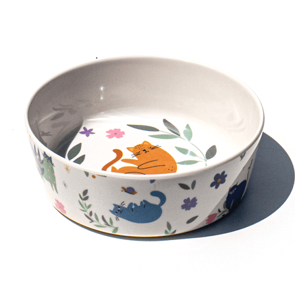 white cat bowl with a cats and flowers design