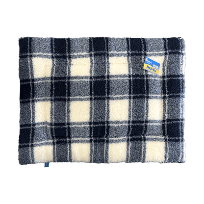 blue white tartan snug'em  showing the tartan side
